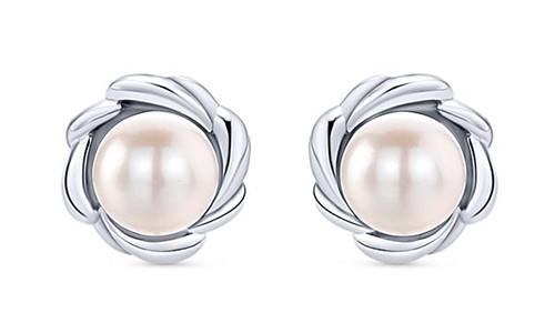 Pearl stud earrings featuring elegant sterling silver