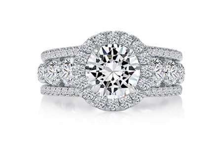 An opulent halo engagement ring from the A.JAFFE Metropolitan collection, available at Long Jewelers.