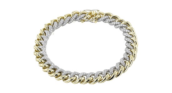 a mixed metal chunky chain bracelet with diamond accents