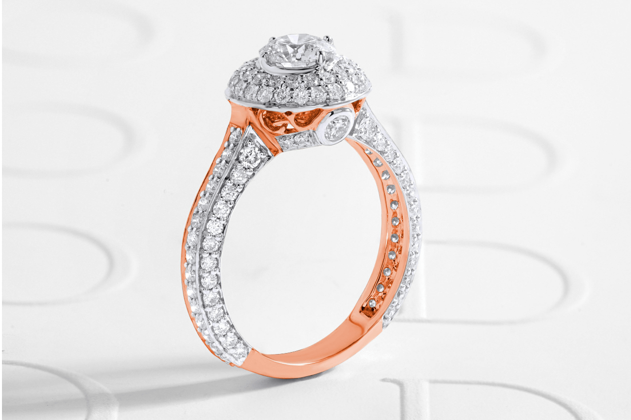 A stunning and ornate engagement ring adorned with many small diamonds.